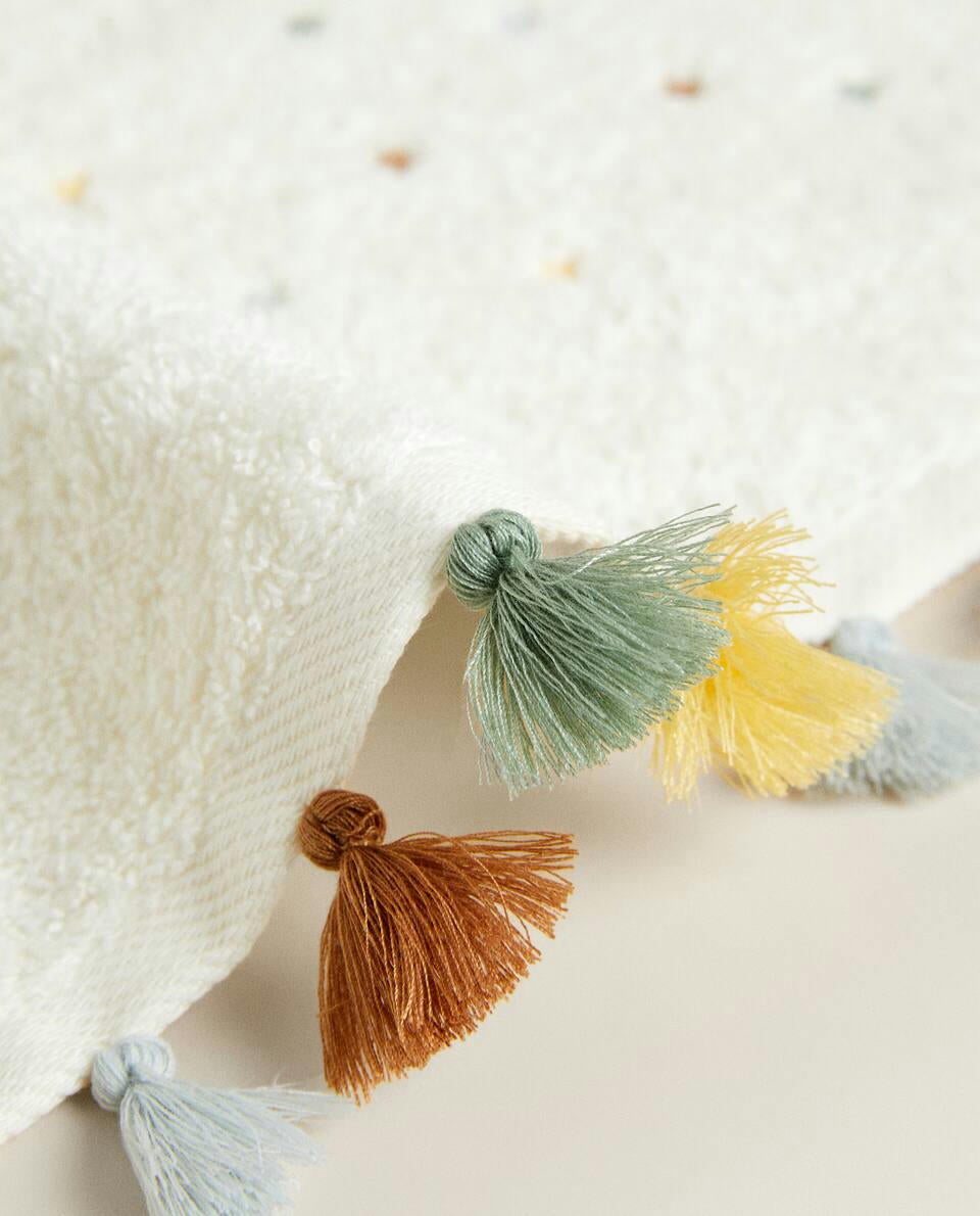 TOWEL WITH TASSELS AND STARS