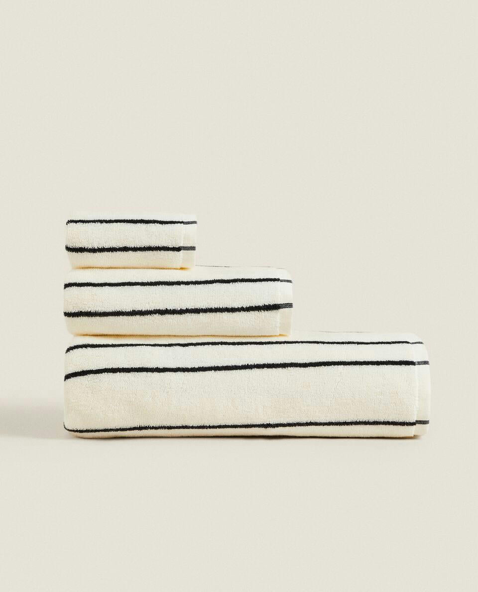 TOWEL WITH IRREGULAR STRIPE DETAIL