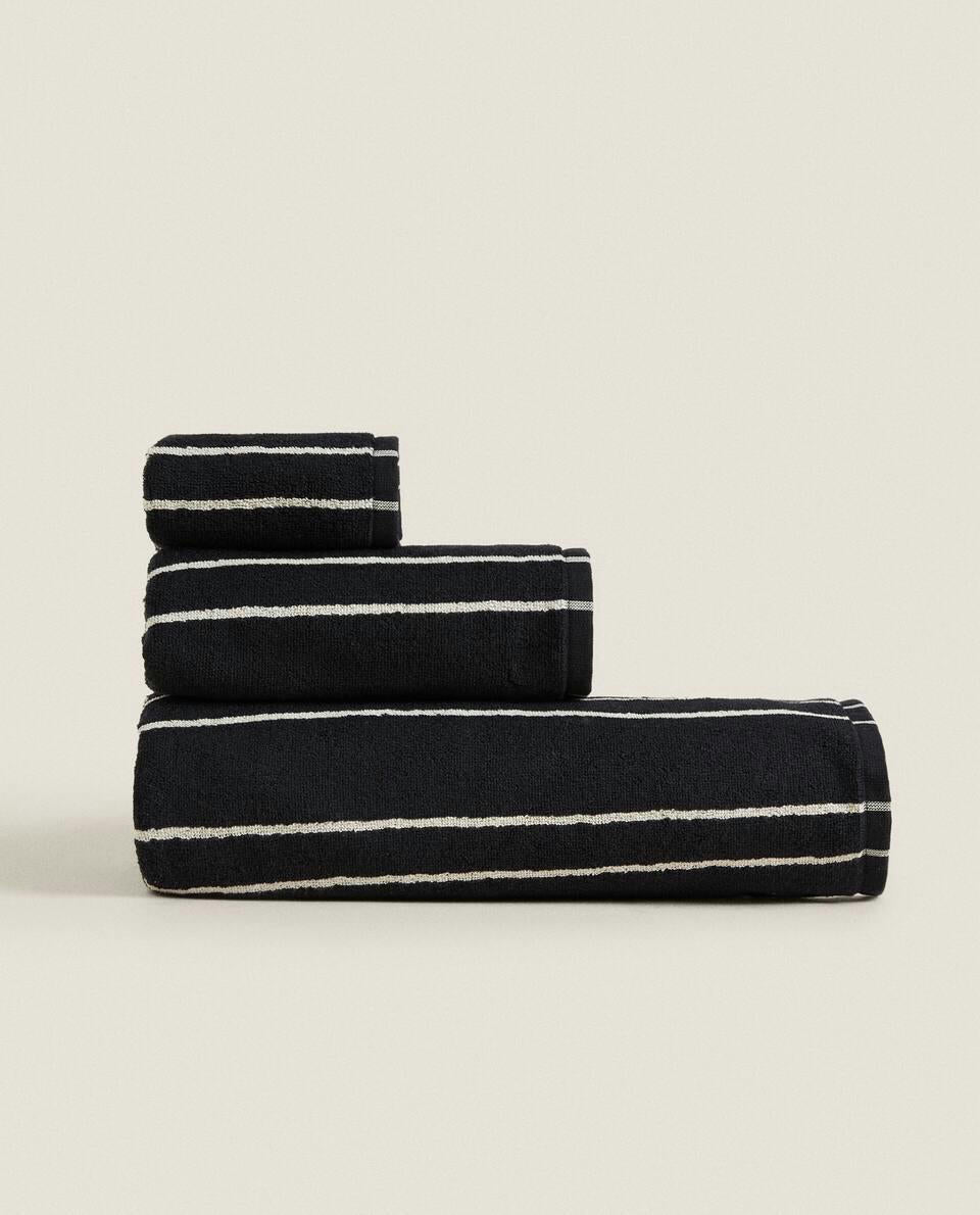 TOWEL WITH IRREGULAR STRIPE DETAIL