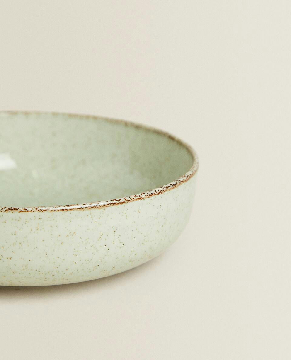 PORCELAIN BOWL WITH ANTIQUE FINISH RIM
